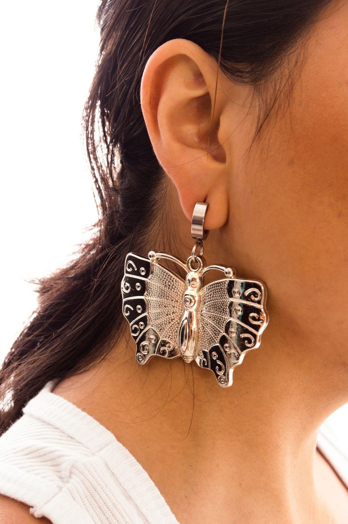 aretes mariposa